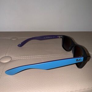 Ray-Ban New Wayfarer RB2132. Black frame, blue and purple temples 55mm